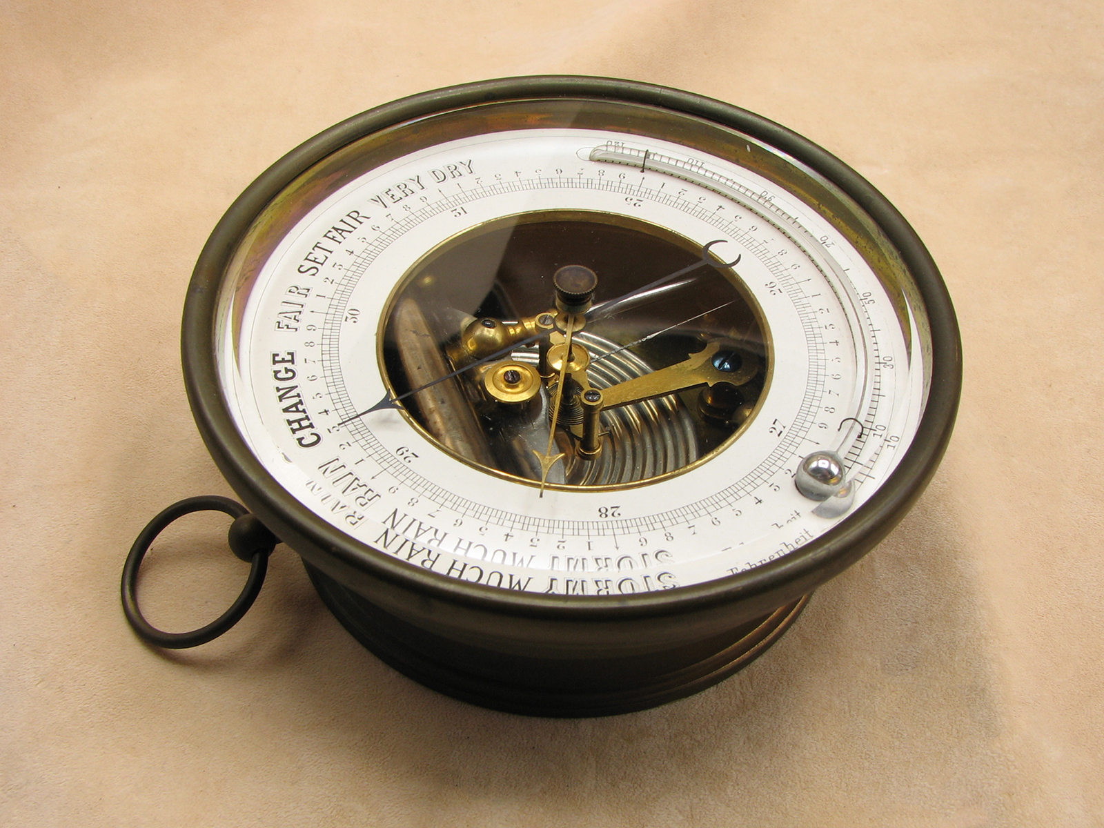 19th century aneroid barometer with curved thermometer